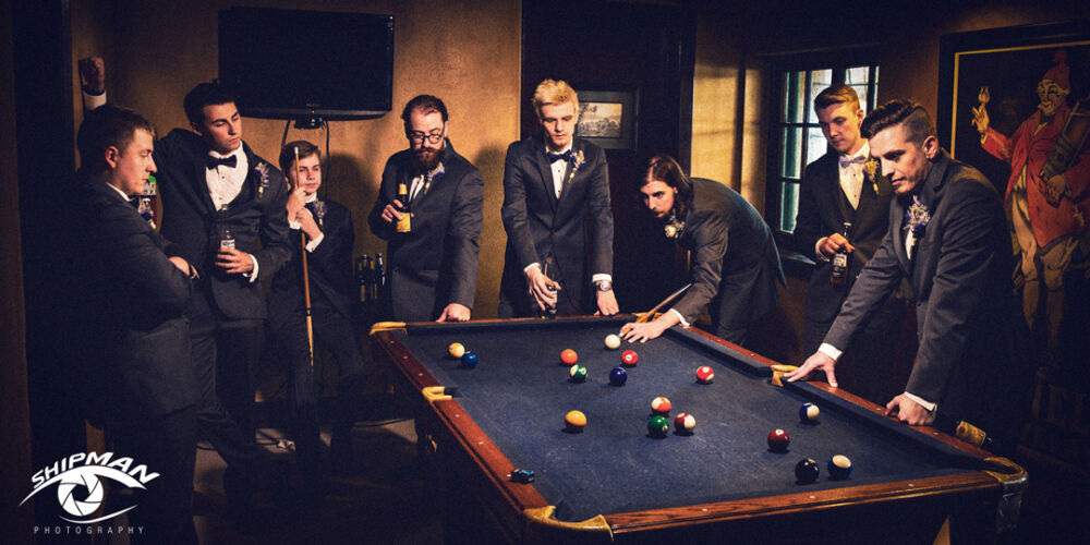 groomsmen playing pool