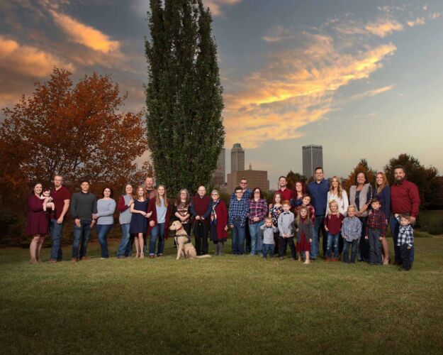 Family Photo in the park with downtown Tulsa in the background