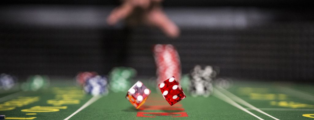 Dice bouncing on gaming table commercial advertising