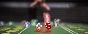 Dice bouncing on gaming table commercial advertising