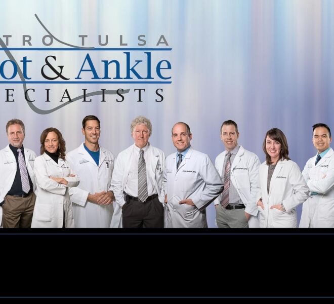 team composite of several podiatrists standing together in white lab coats