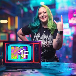 Young woman with green hair and def leppard shirt standing behind TV in a colorful bar, smiling and doing rock sign with fingers. advertising photography the party tulsa
