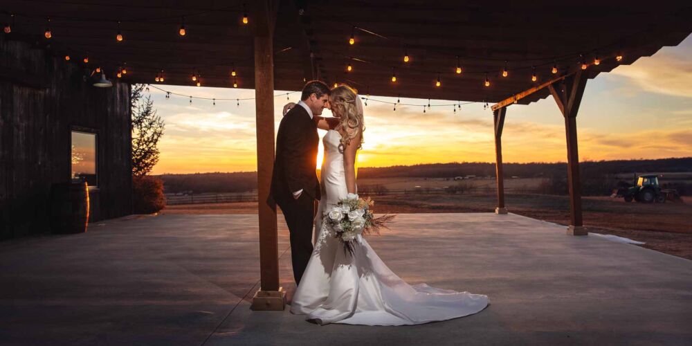beautiful couple sharing a moment after their wedding at sunset