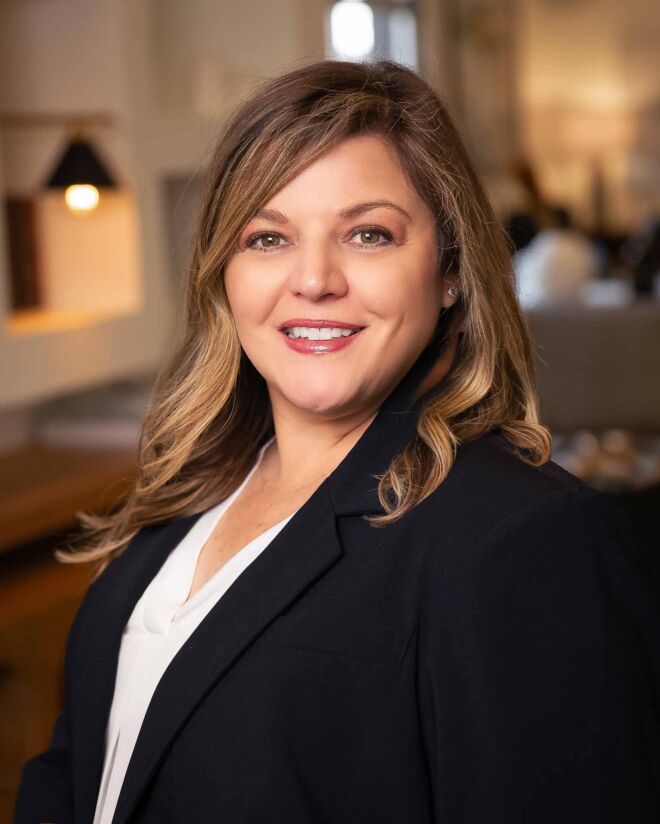smiling businesswoman in a Tulsa office headshot