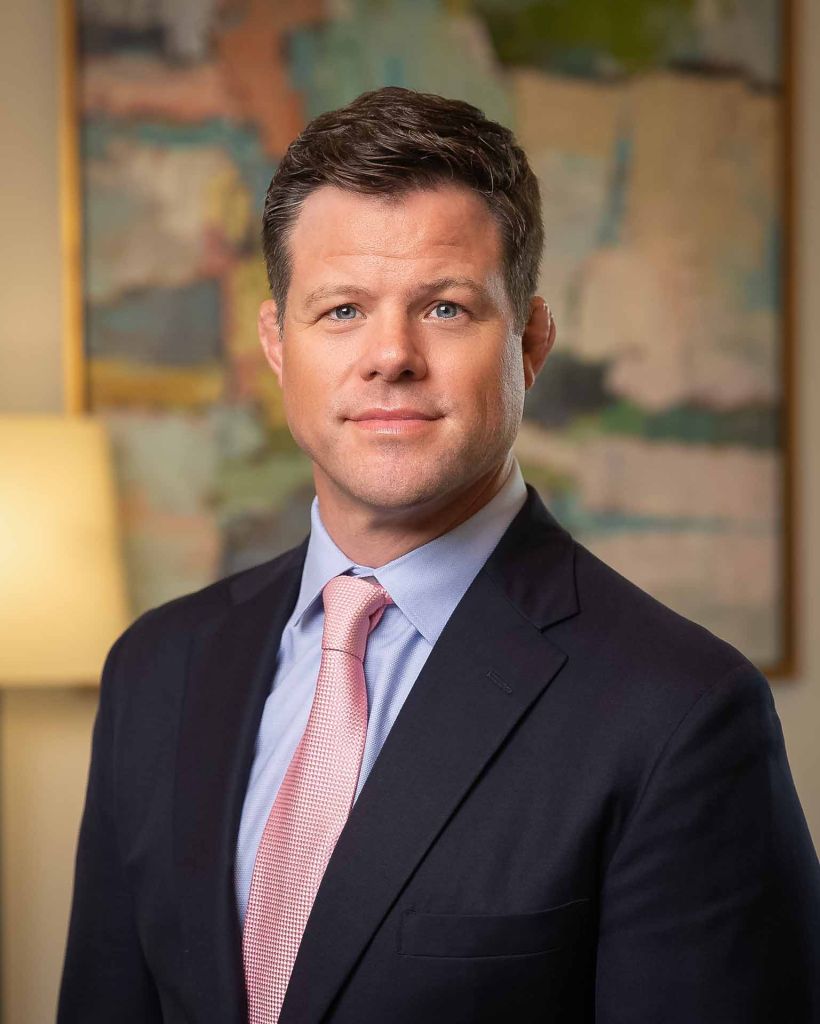 businessman in suit, posing for an on location headshot in Tulsa