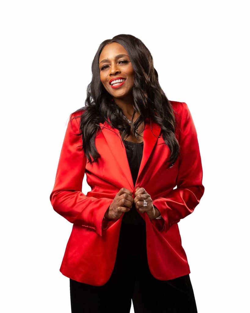 Attractive african american female realtor in red jacket smiling on white background tulsa commercial photography headshot branding
