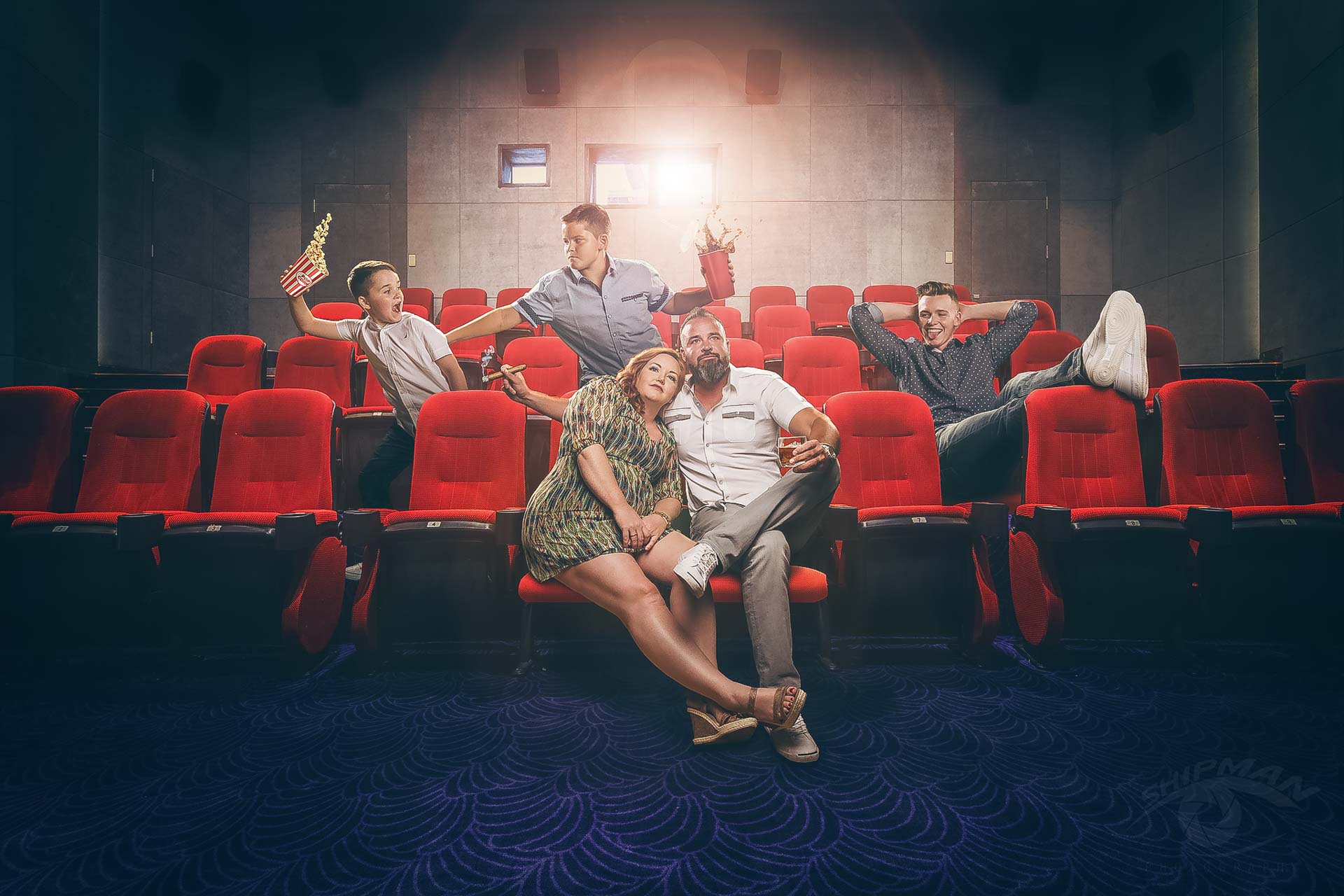 best family portraits tulsa520 Composite image of a family going to the movies together