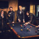 groomsmen playing pool