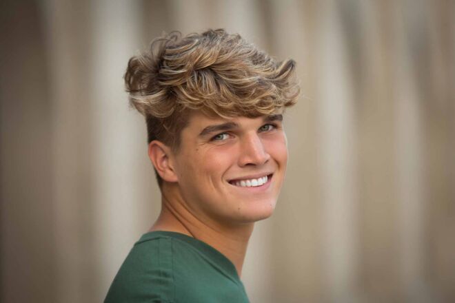 Handsome young man with a big smile