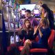 Excited woman wins a jackpot on a billboard image for River Sprit Casino in Tulsa.