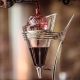 red wine being poured over a crystal decanter in a fine dining restaurant in Tulsa