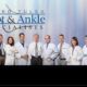 team composite of several podiatrists standing together in white lab coats
