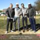 golf tournament team posing for photo on green posed event photography in Tulsa