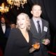 couple having fun at corporate party Candid event photography in Tulsa