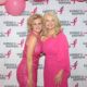 ladies in Pink posing at Susan G Koman fundraiser posed event photography in Tulsa