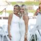 ladies in all white at a fundraising gala - Candid event photography in Tulsa