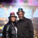 Couple posing for photo at hard rock New Years Party posed event photography in Tulsa