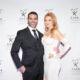 Couple posing on the red carpet, candid event photography