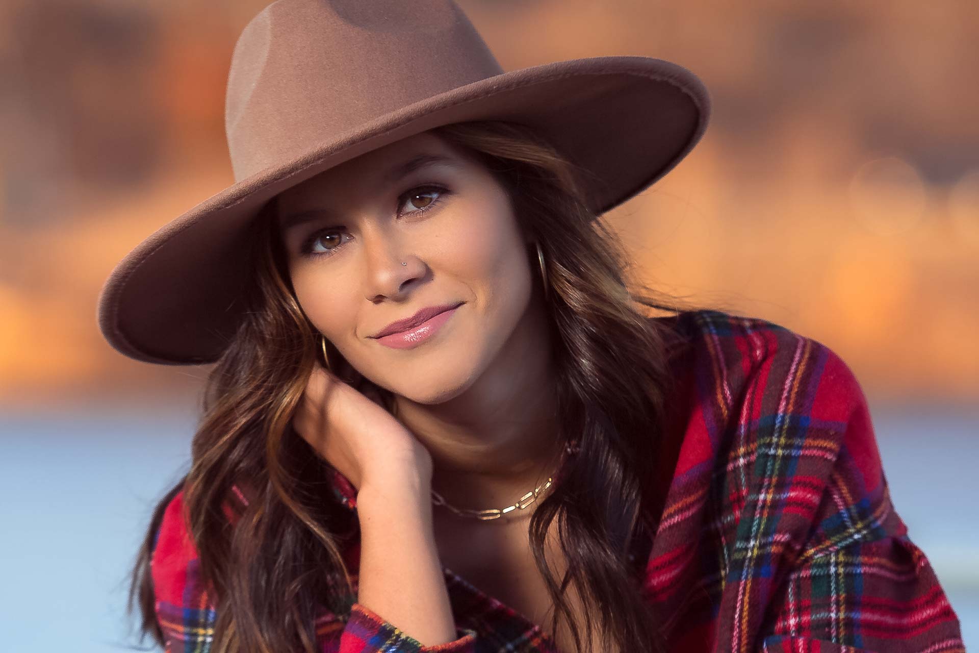best tulsa senior portraits418 beautiful young woman in a plaid shirt and cowboy hat at the lake