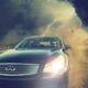 young man in a car with a storm bearing down on him